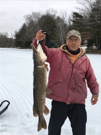 Fully Guided Ice fising with Six Fins Guide Service, Central Maine.