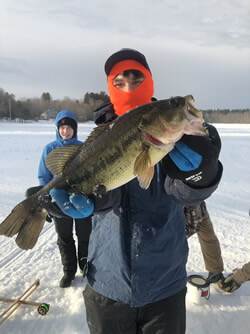 Man with very large Largemouth Bass.