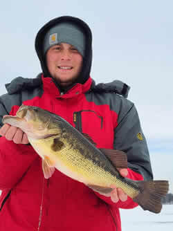 Man holding Largemouth Bass.