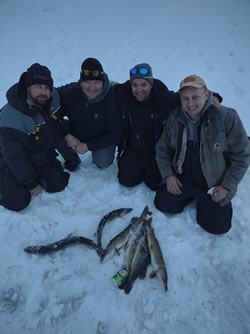 Group of men with their day's catch.